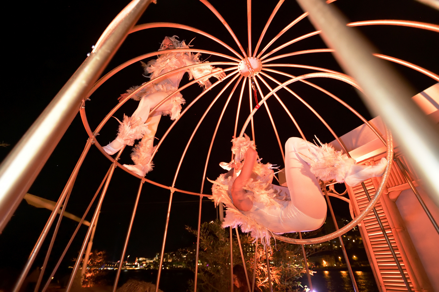 acrobats with white bird costumes as birthday party entertainment