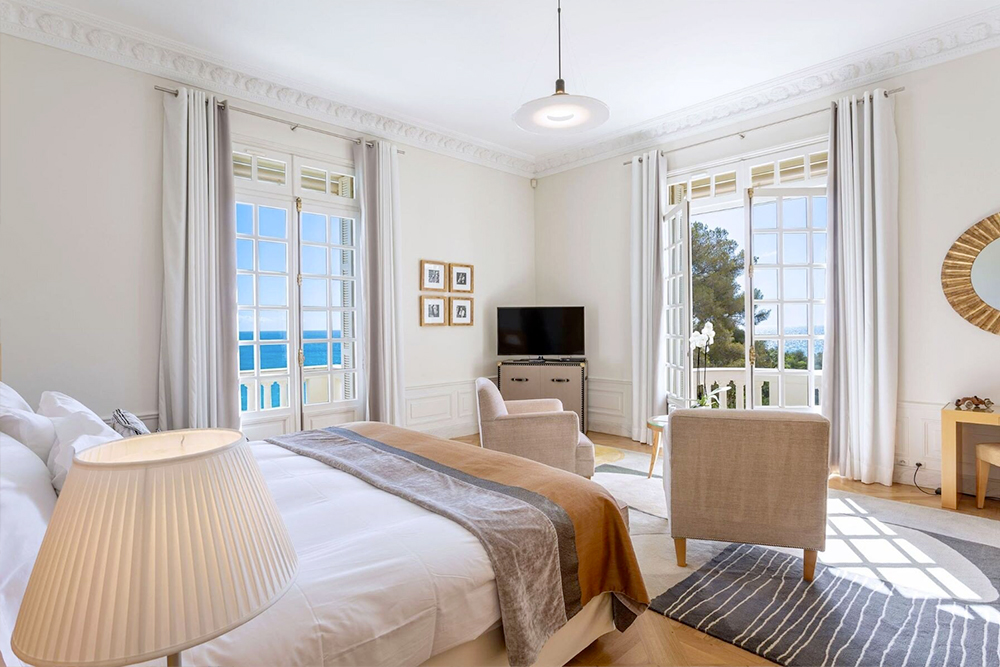 Bedroom with sea view at luxury Belle Epoque wedding villa on the French Riviera