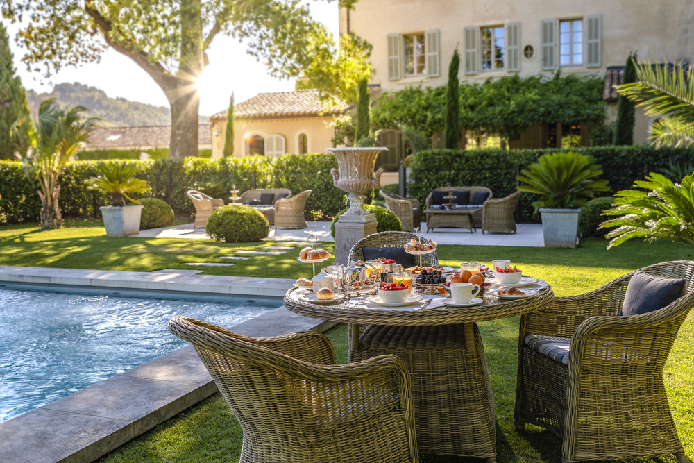 Breakfast in the garden of luxury chateau d'Estoublon in Provence