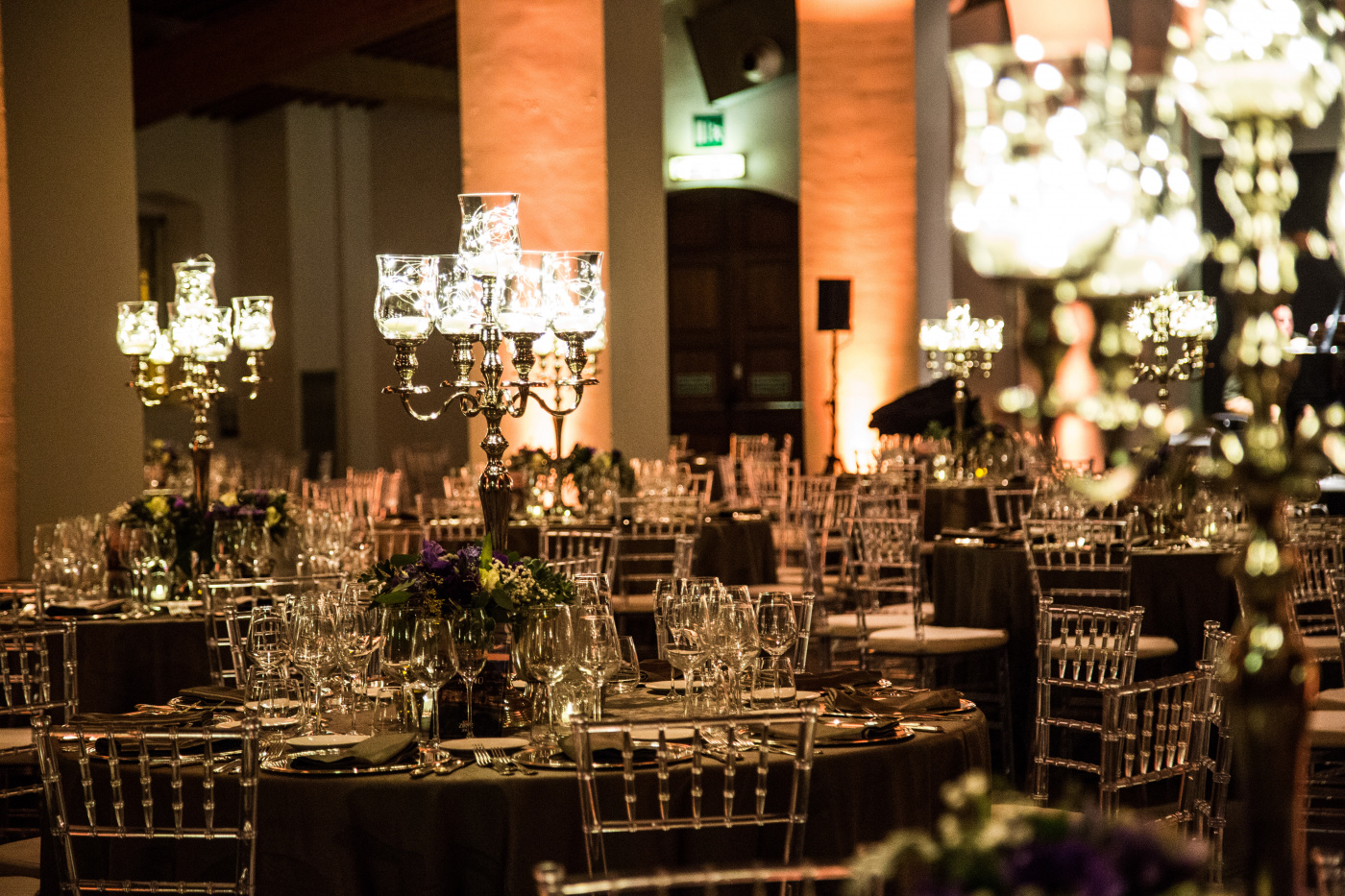 Corporate event for international bank with silver candelabras and round tables