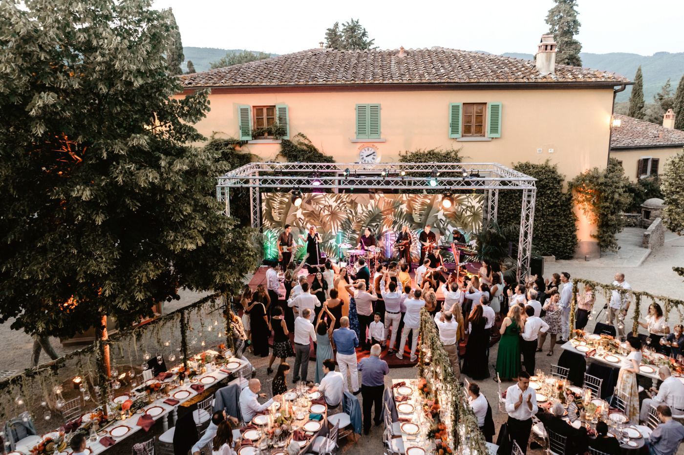 Outdoor birthday party with stage and dancing floor