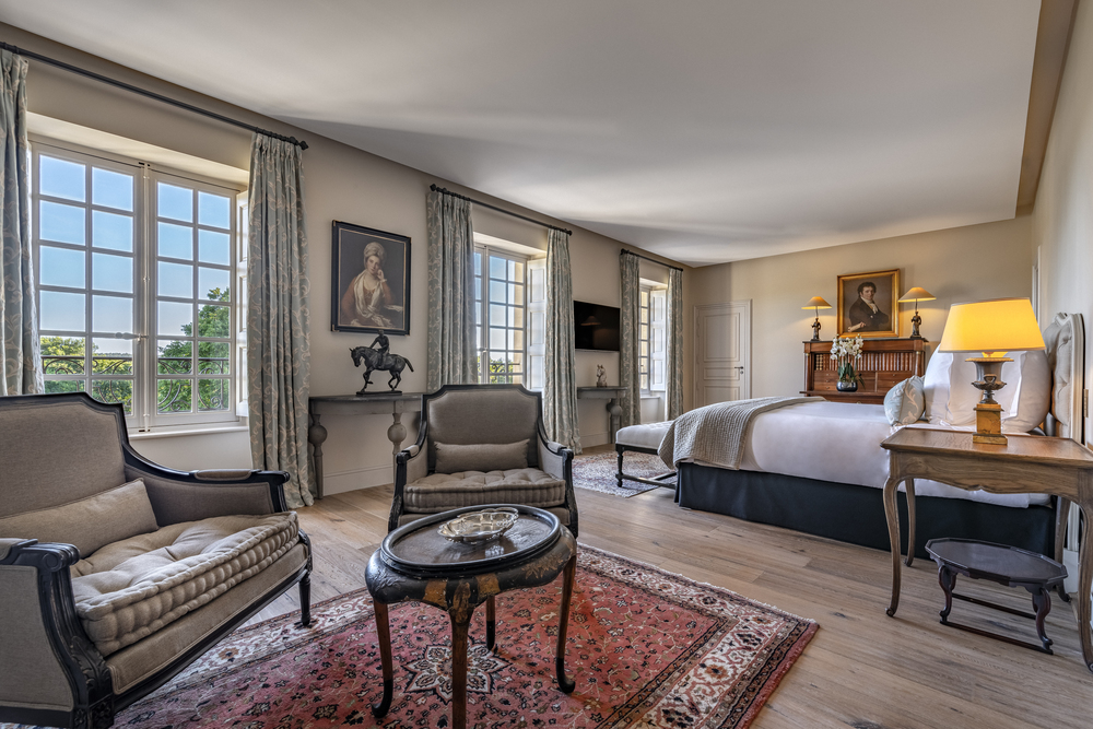 Elegant suite with windows of luxury chateau d'Estoublon in Provence