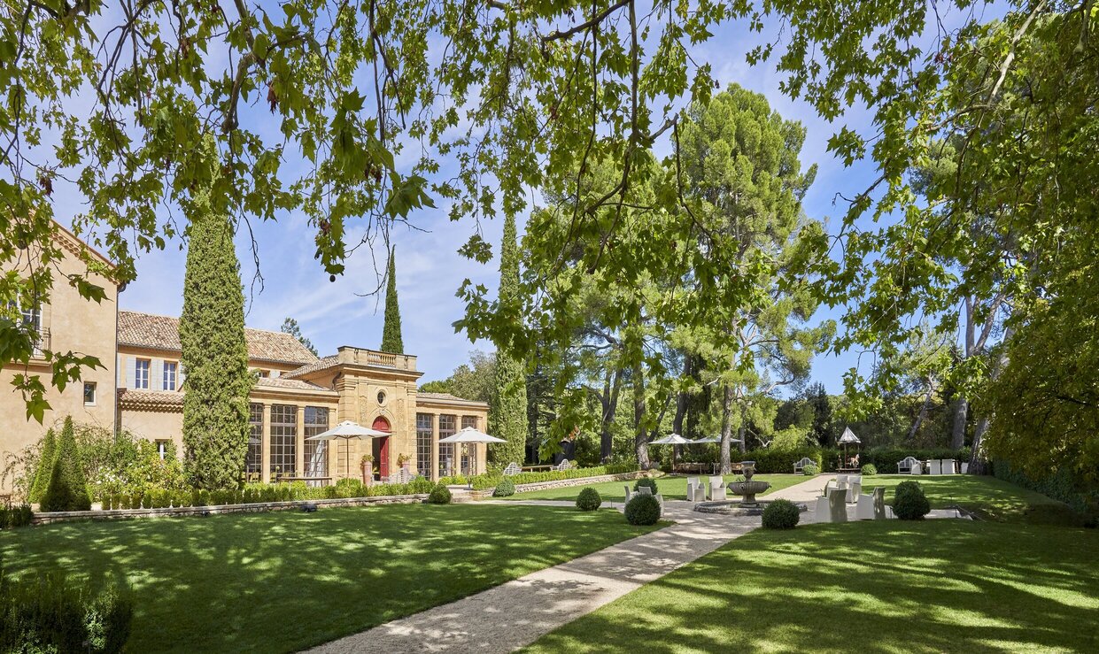 Garden with relax area at luxury wedding castle in France