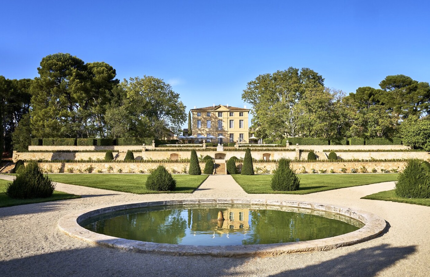 Garden with fountain at luxury wedding castle in France