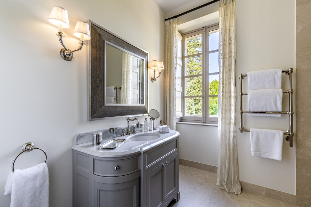 Gray bathroom of a suite at the luxury wedding chateau d'Estoublon in Provence