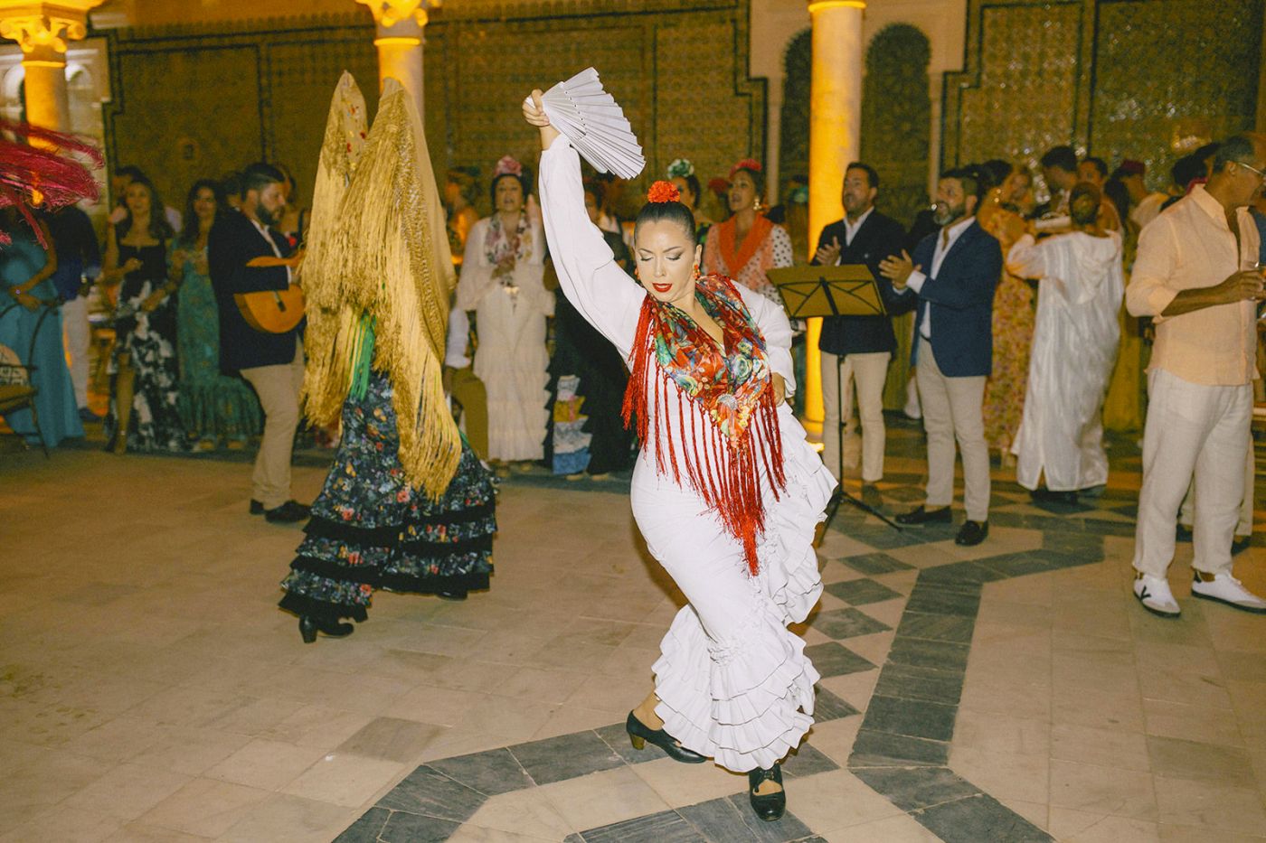 Ladies dancing flamenco at Andalusian-Moorish party in Seville Spain