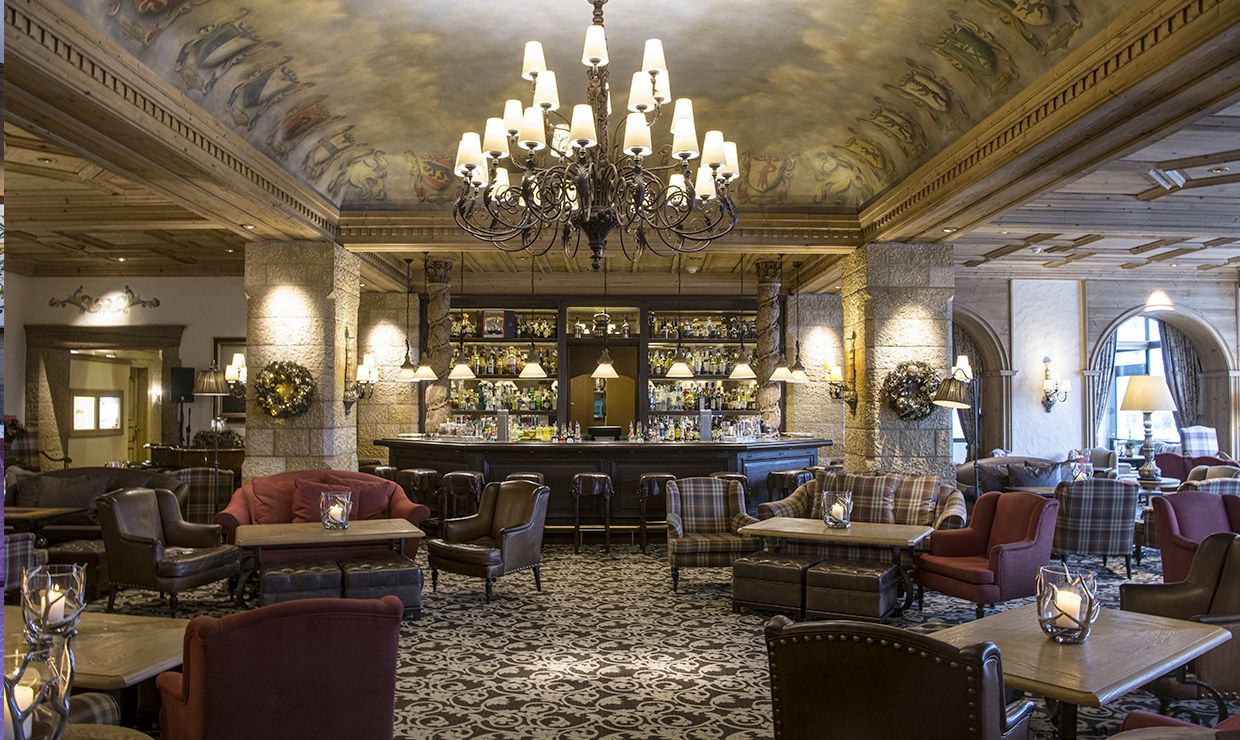 Living room with bar counter at luxury wedding resort in Gstaad