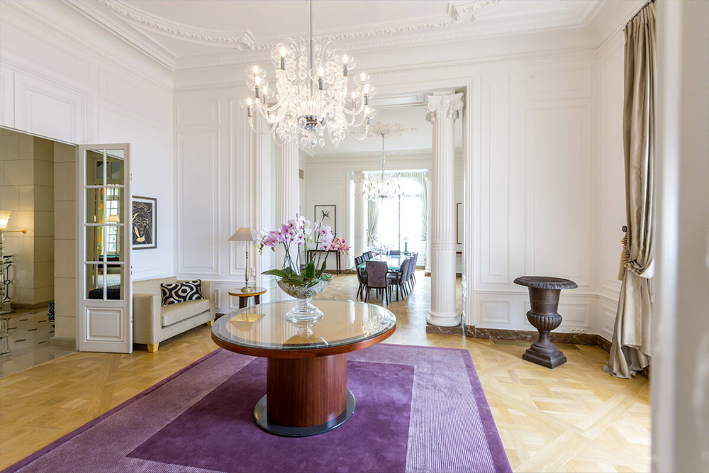 Living room with chandelier at luxury Belle Epoque wedding villa on the French Riviera