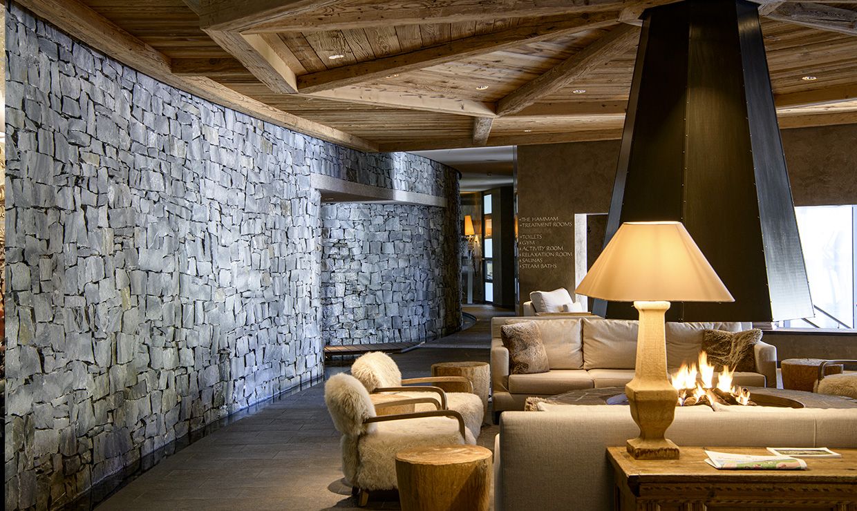 Living room with fireplace at luxury wedding resort in Gstaad