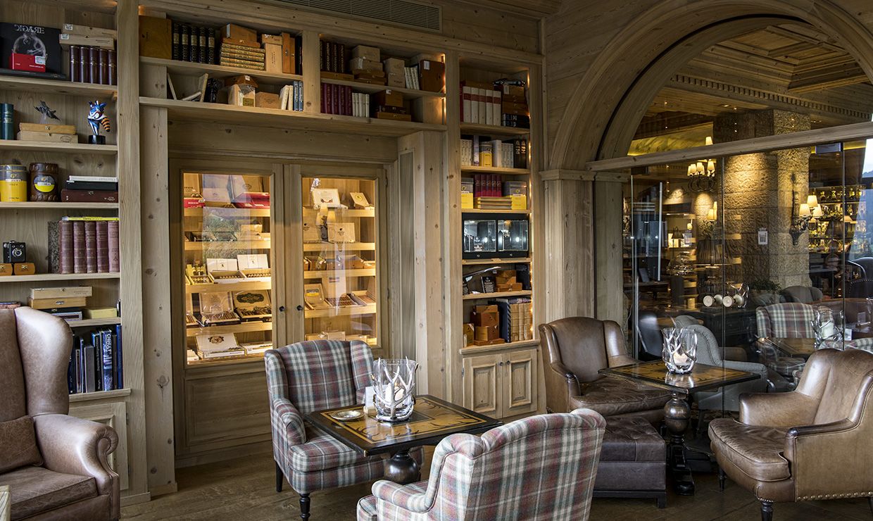 Living room with library at luxury wedding resort in Gstaad