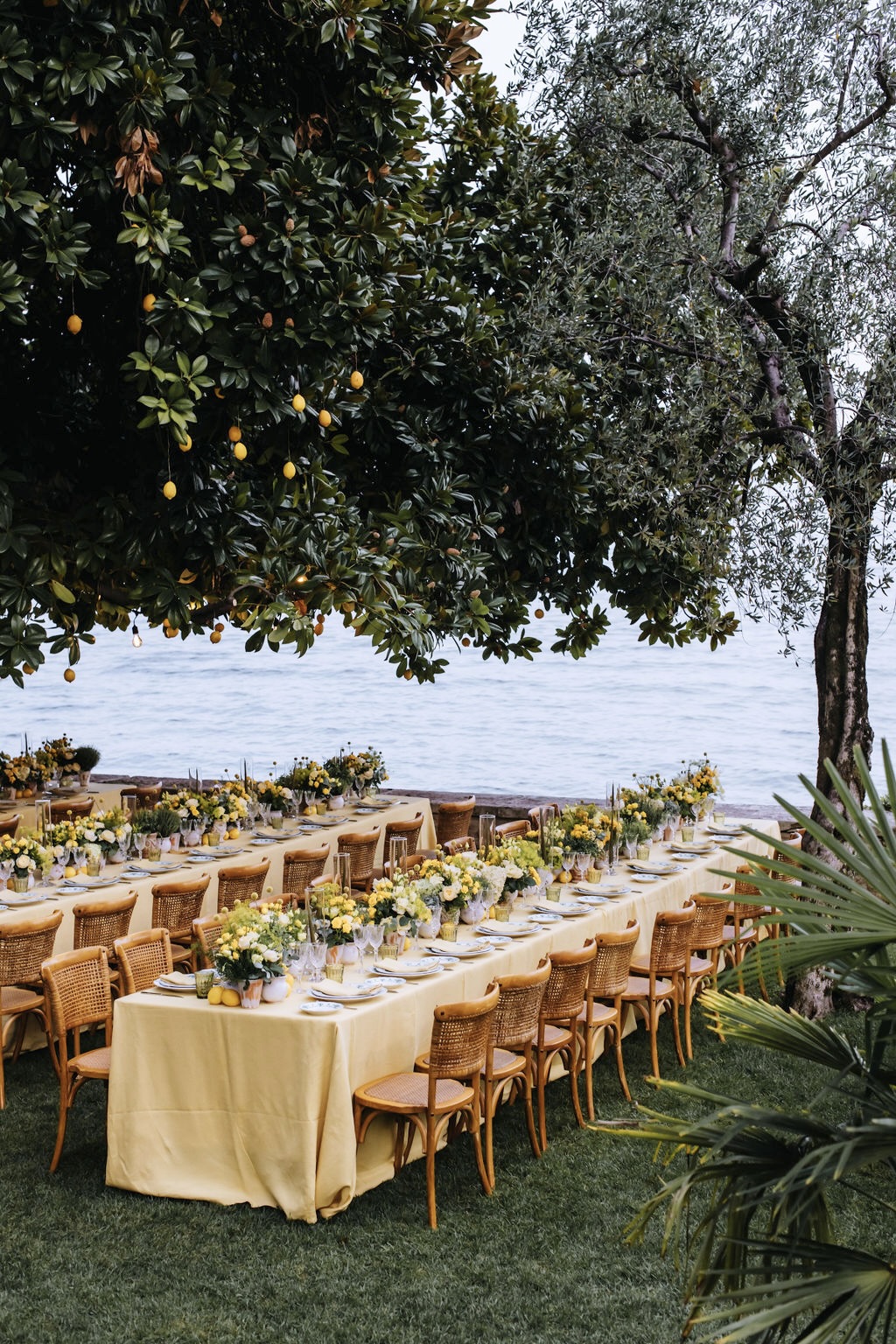 Long tables with lemons and Lake Garda view