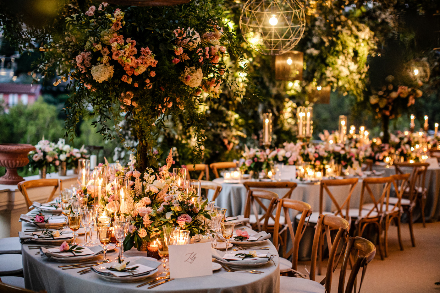 Wedding dinner in Montecarlo with hanging greenery and candles