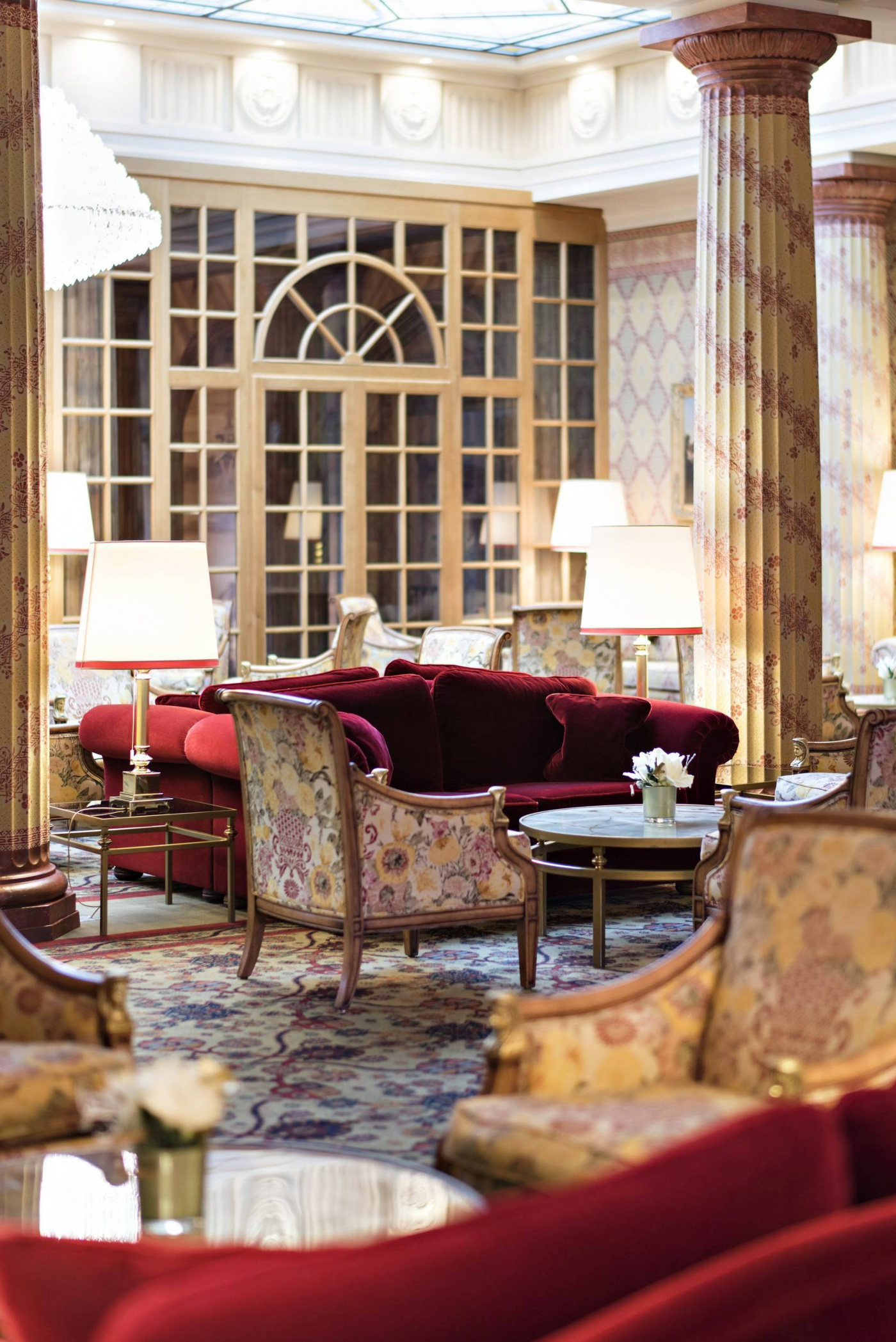 Indoor details with red sofas hotel saint moritz