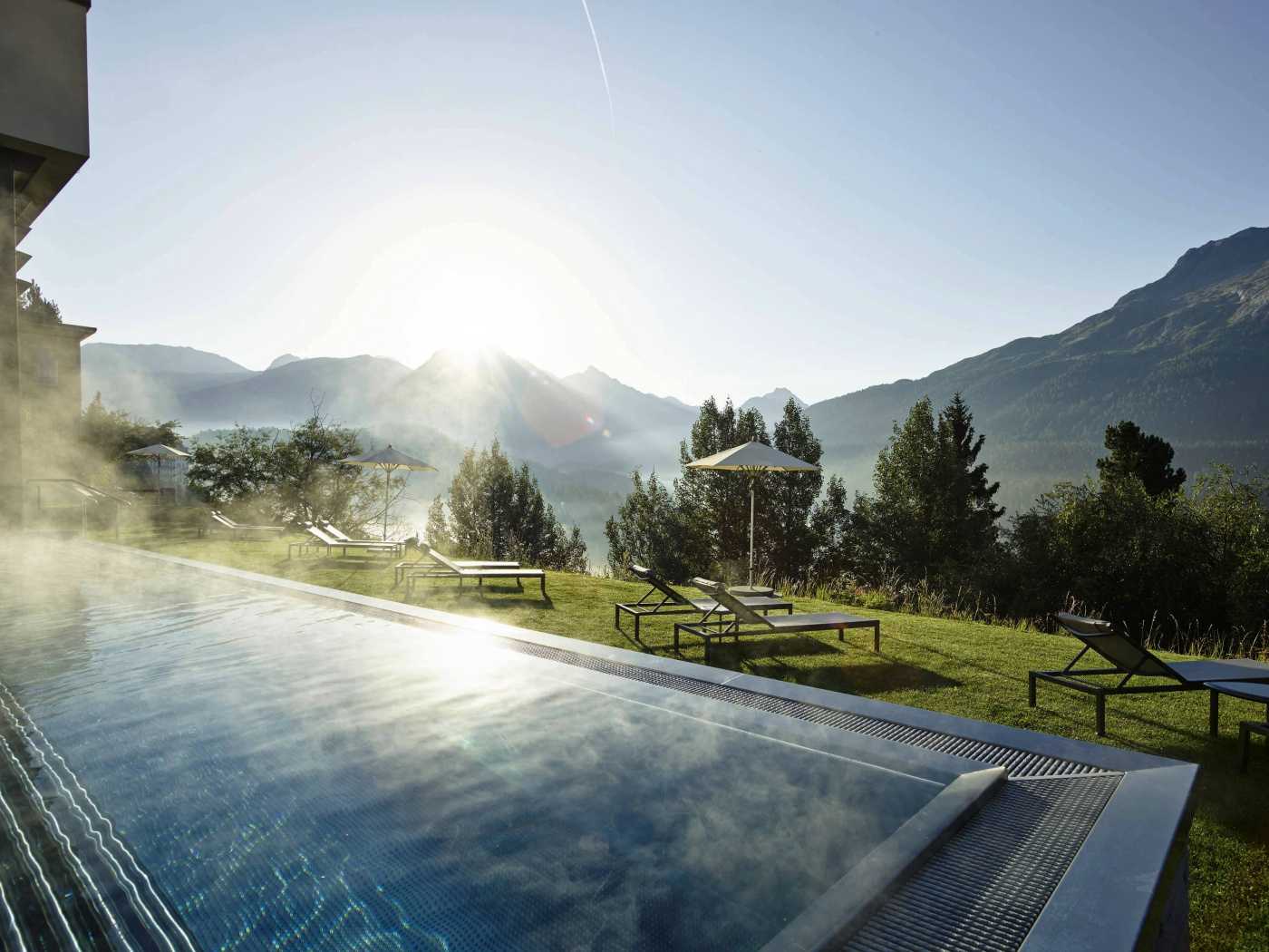 outdoor swimmingpool with summer view in saint moritz