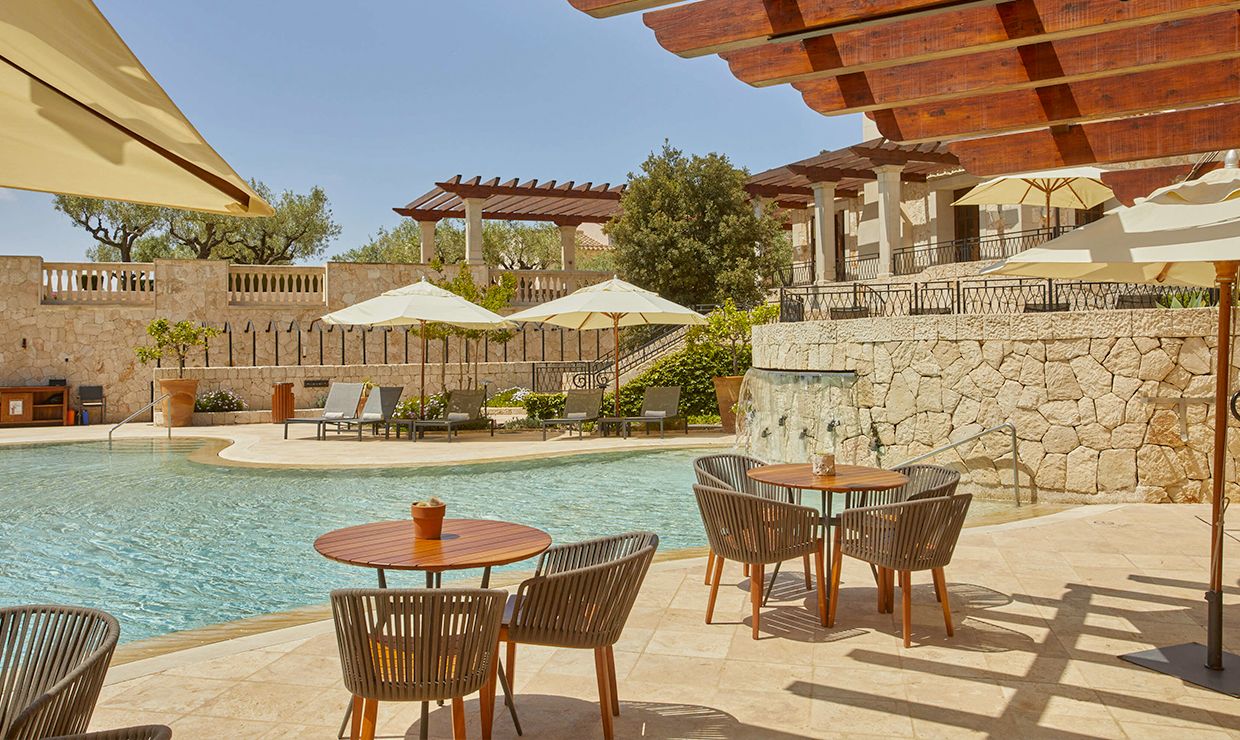 Pool bar terrace of grand hotel village for weddings in Mallorca