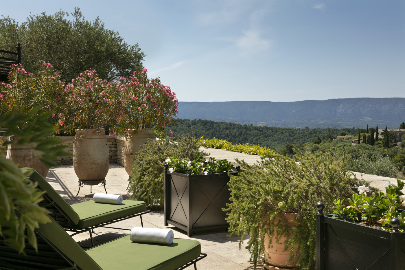 Relax area with flowers and view of luxury wedding estate in Provence