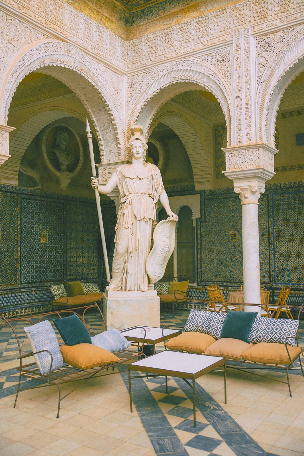 Statue in the courtyard at Andalusian-Moorish party in Seville Spain