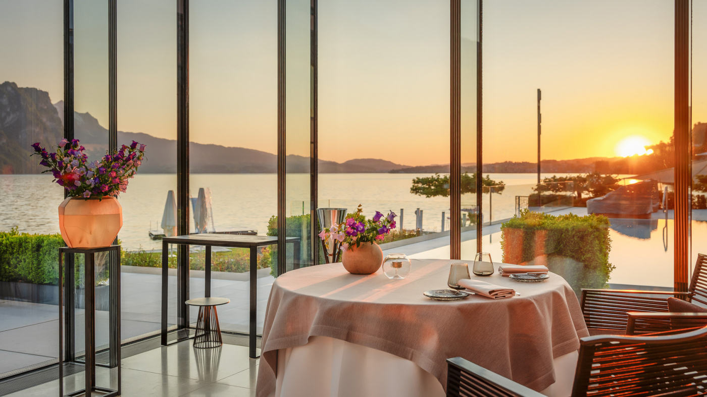 Sunset view of restaurant at luxury wedding venue on Lake Lucerne