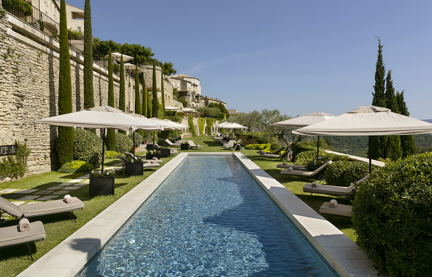 Swimming pool at garden with olive trees at luxury villa in France