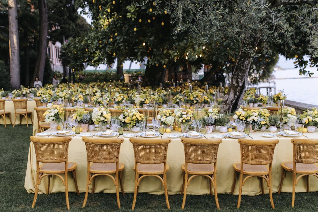 Tables with yellow green white colors on Lake Garda