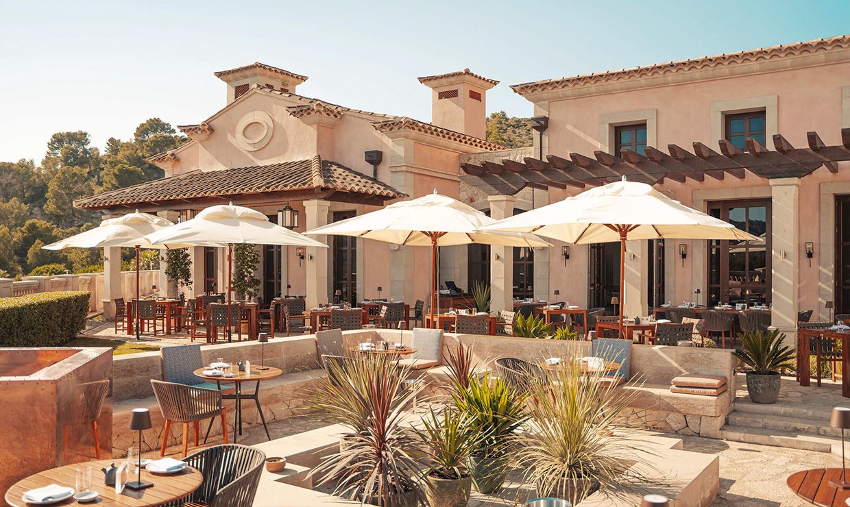 Terrace of restaurant at luxury grand hotel village in Mallorca for weddings