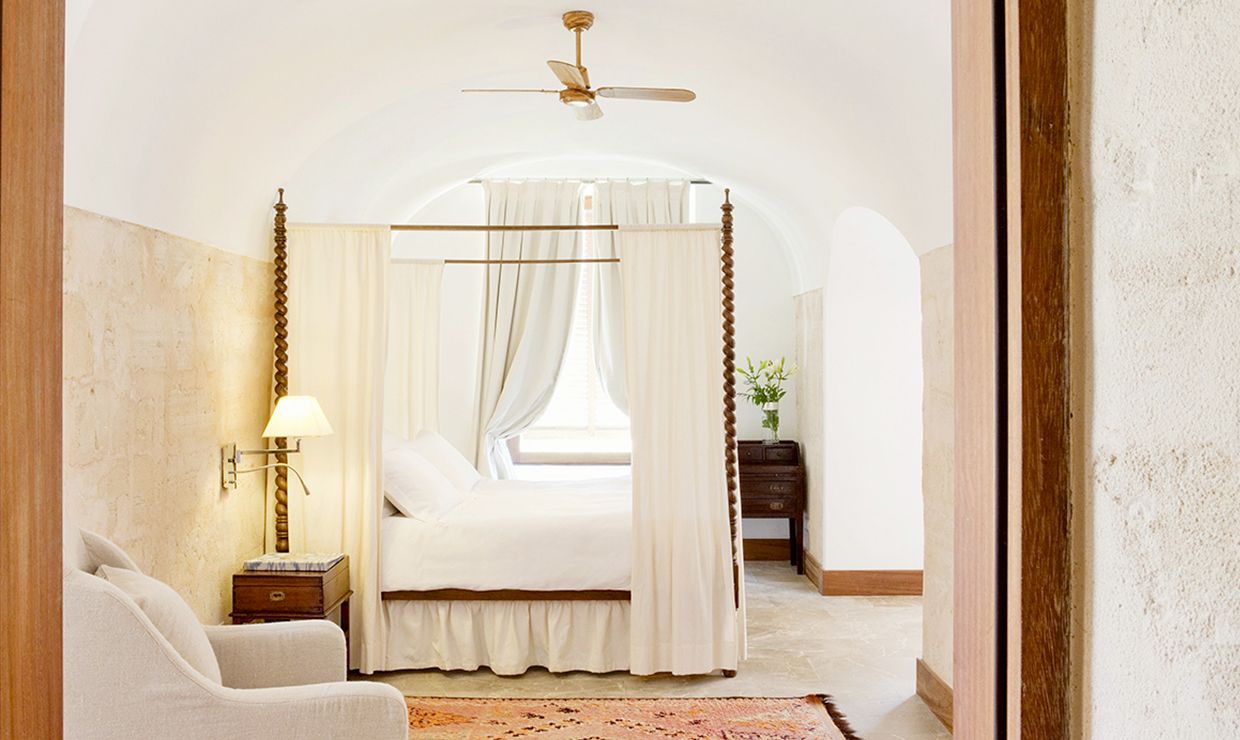 White bedroom of Cap Rocat luxury boutique hotel for weddings in Mallorca