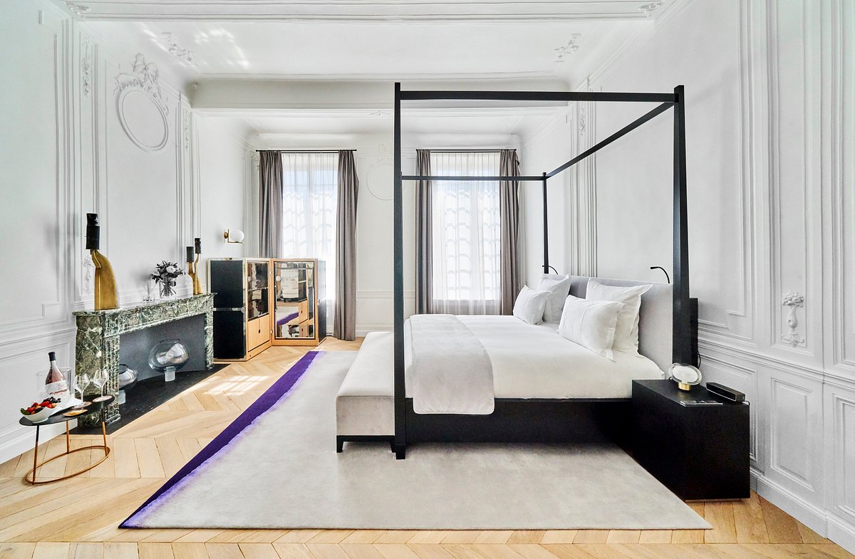 White bedroom at luxury wedding castle in France