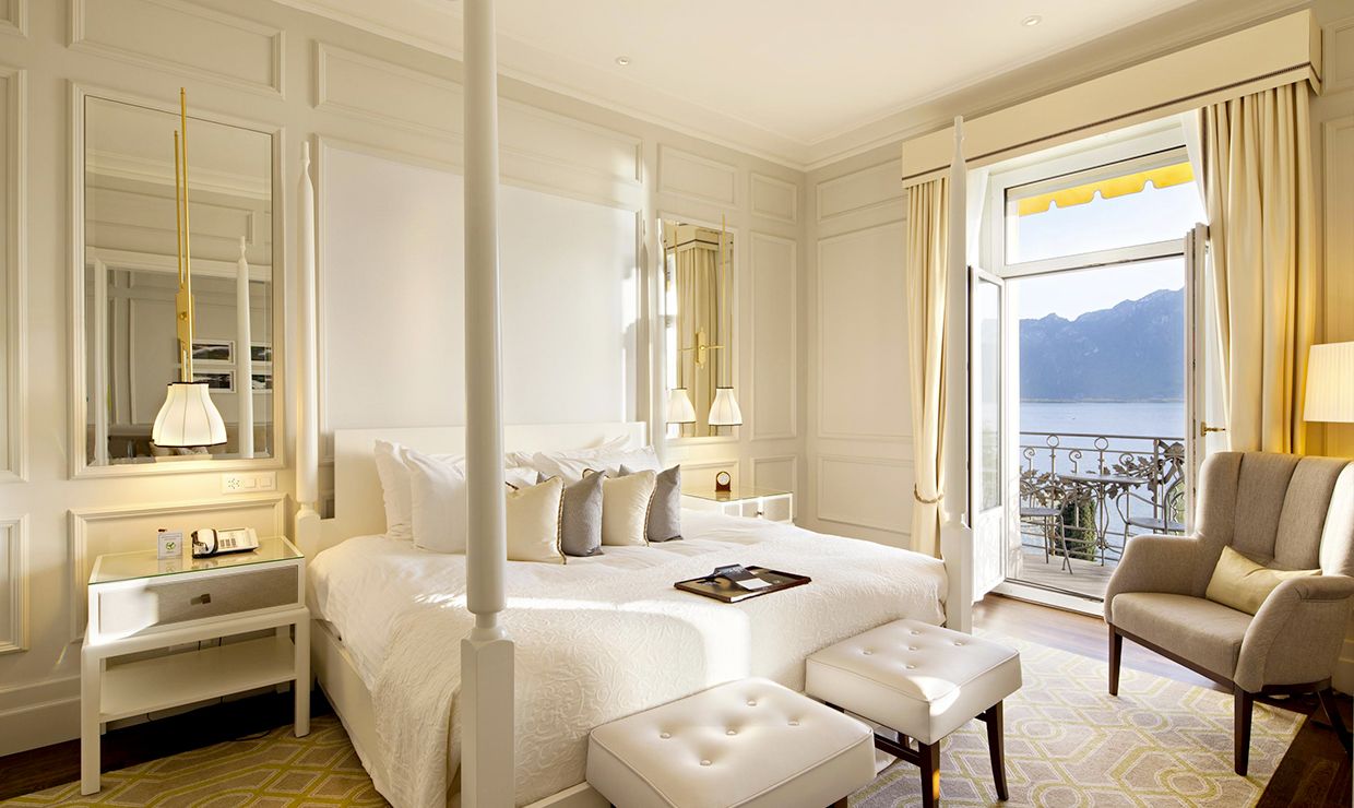 White bedroom at luxury wedding resort on Lake Geneva