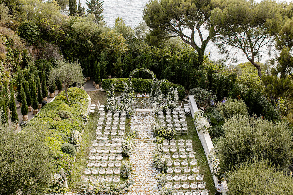 White ceremony in the garden of luxury Belle Epoque wedding villa on the French Riviera