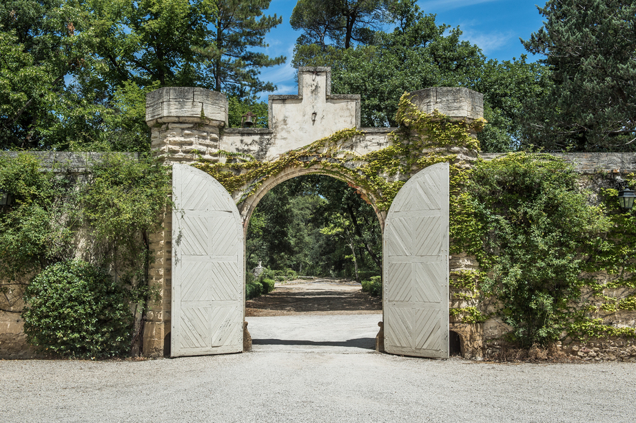White gate of luxury chateau for weddings in France